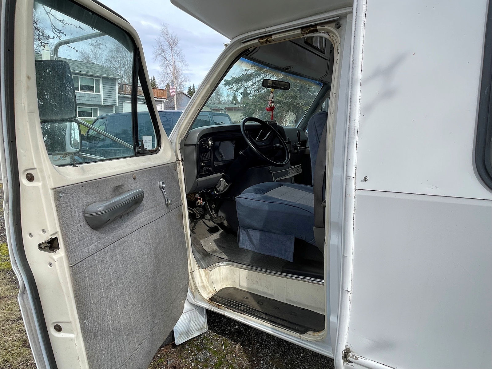 Driver seat inside Ford Econoline 350 food truck