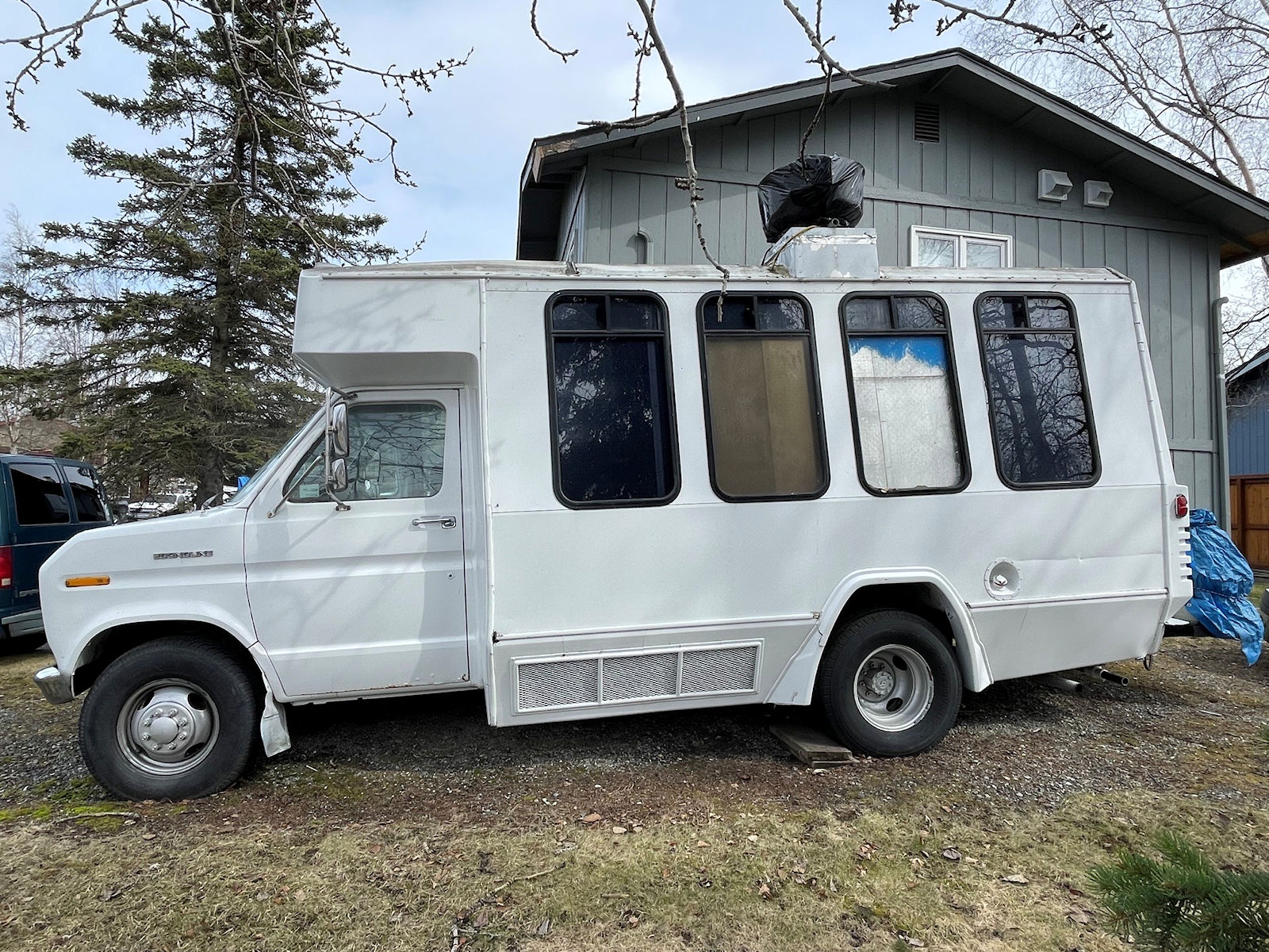 Driver side view of Ford Econoline 350 food truck for sale in Anchorage Alaska