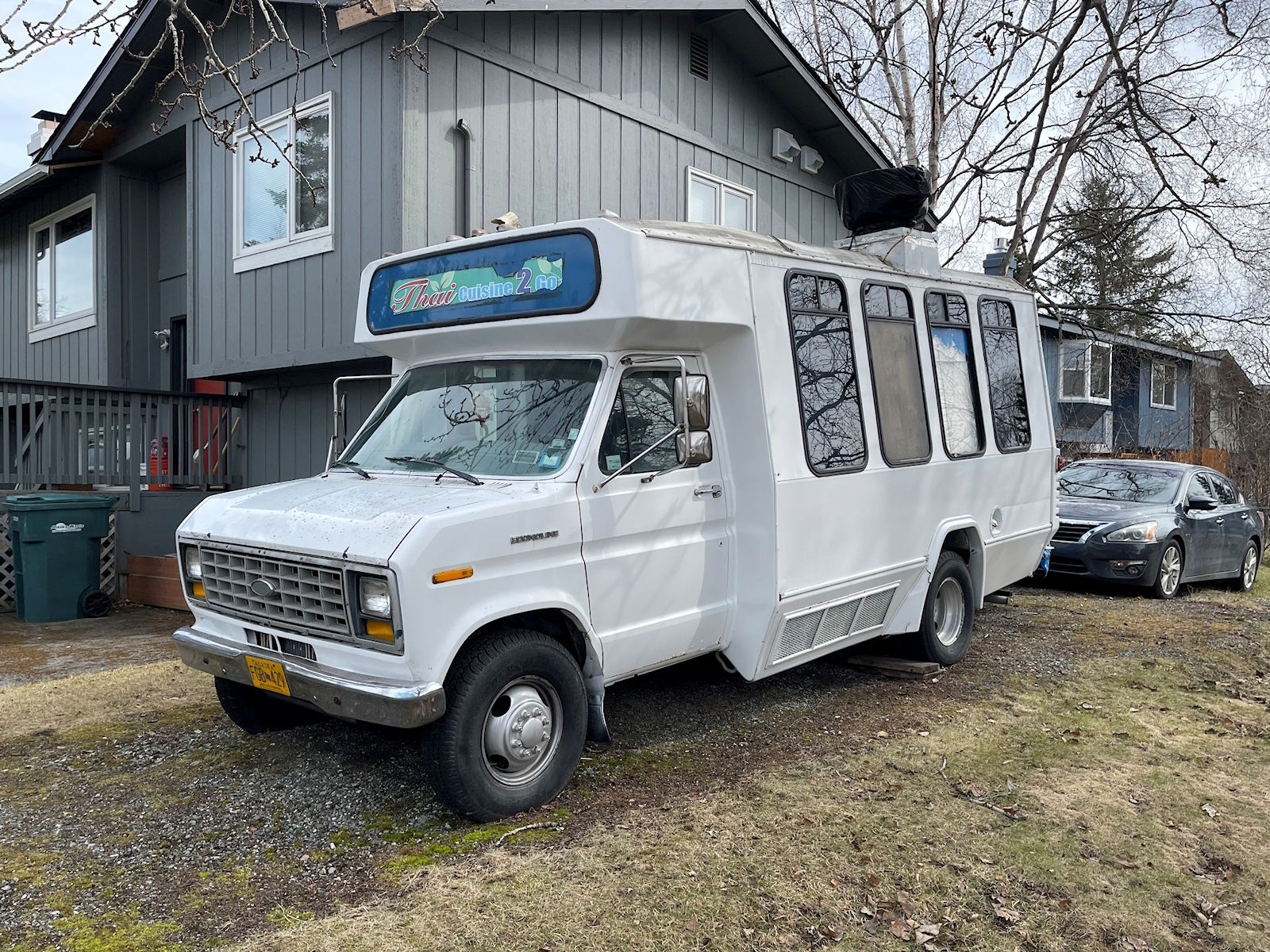 Driver side front view of food truck with commercial kitchen