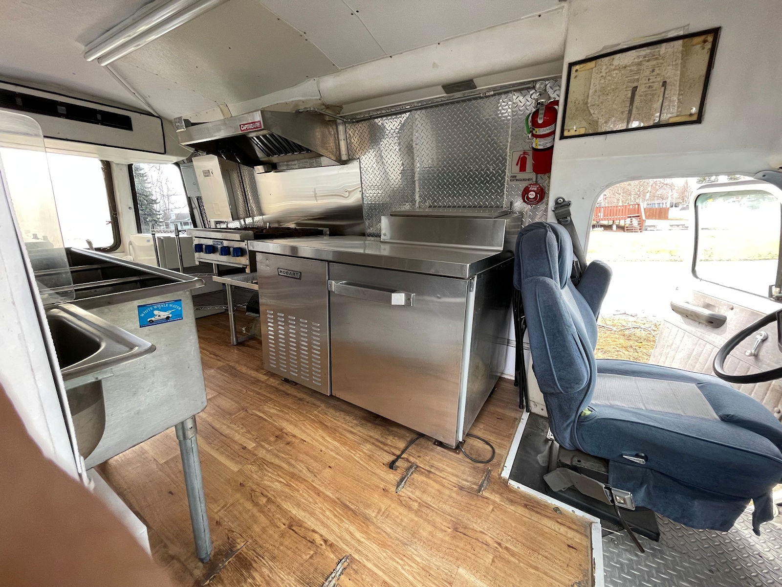 Commercial kitchen interior inside food truck - kitchen photo 1