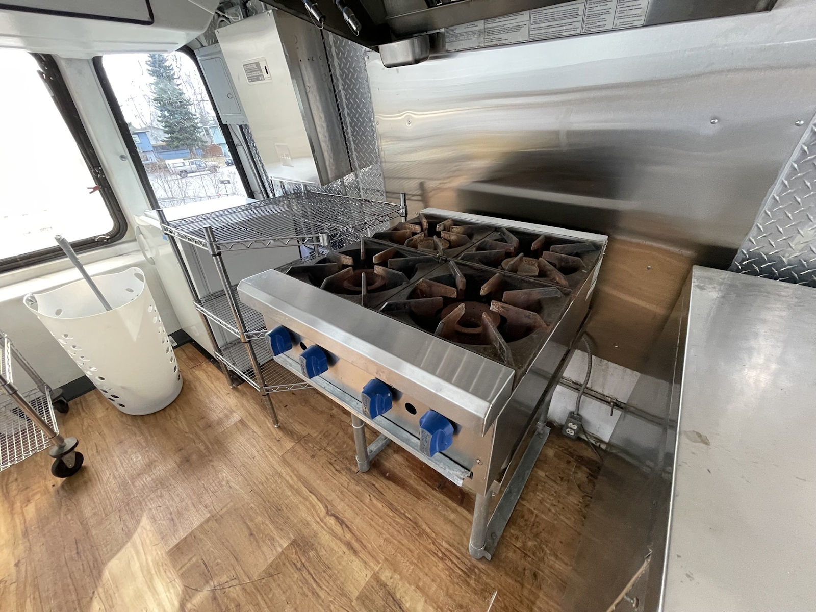 Commercial kitchen interior inside food truck - kitchen photo 10