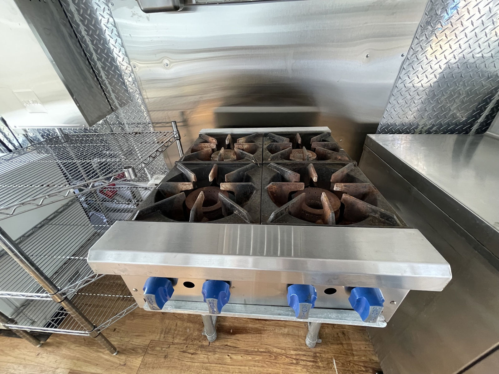 Commercial kitchen interior inside food truck - kitchen photo 12
