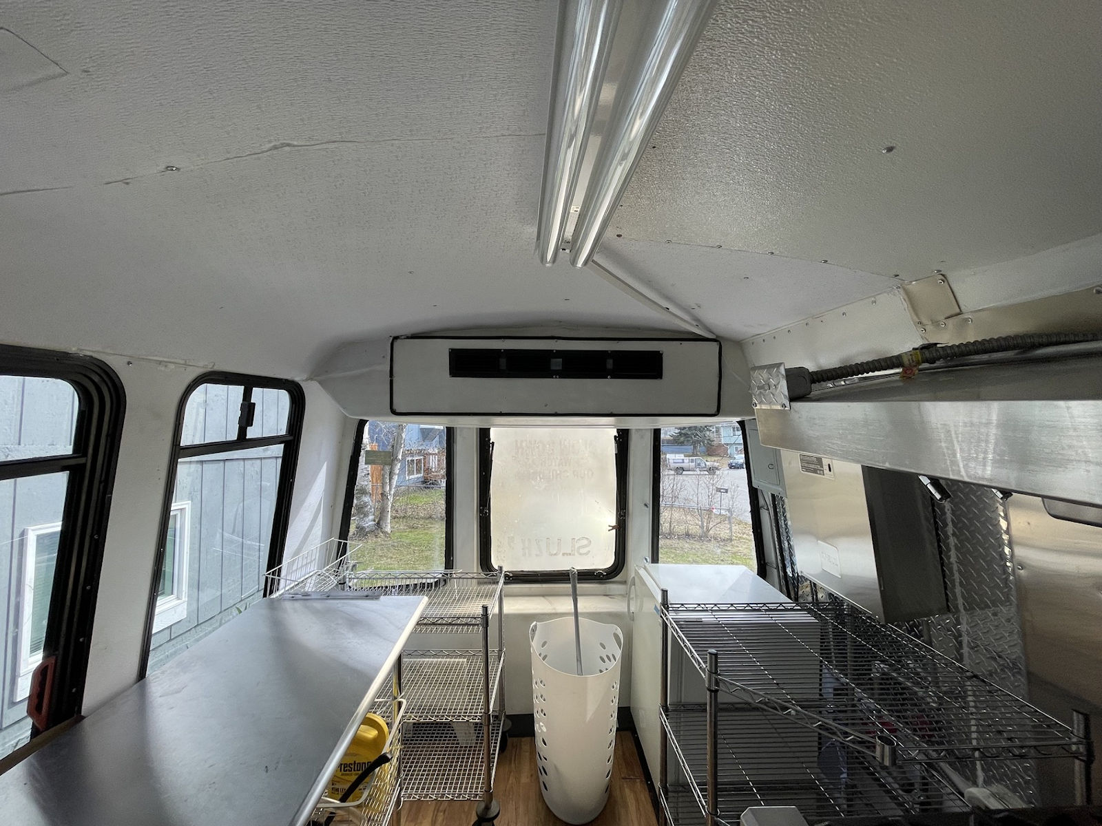 Commercial kitchen interior inside food truck - kitchen photo 15