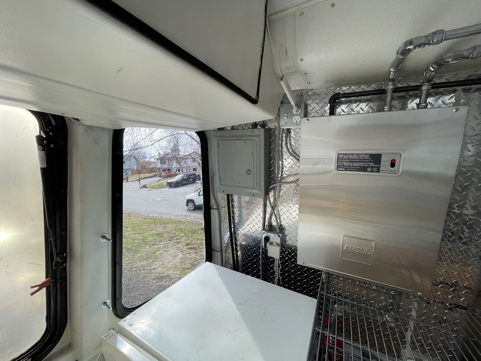 Commercial kitchen interior inside food truck - kitchen photo 17