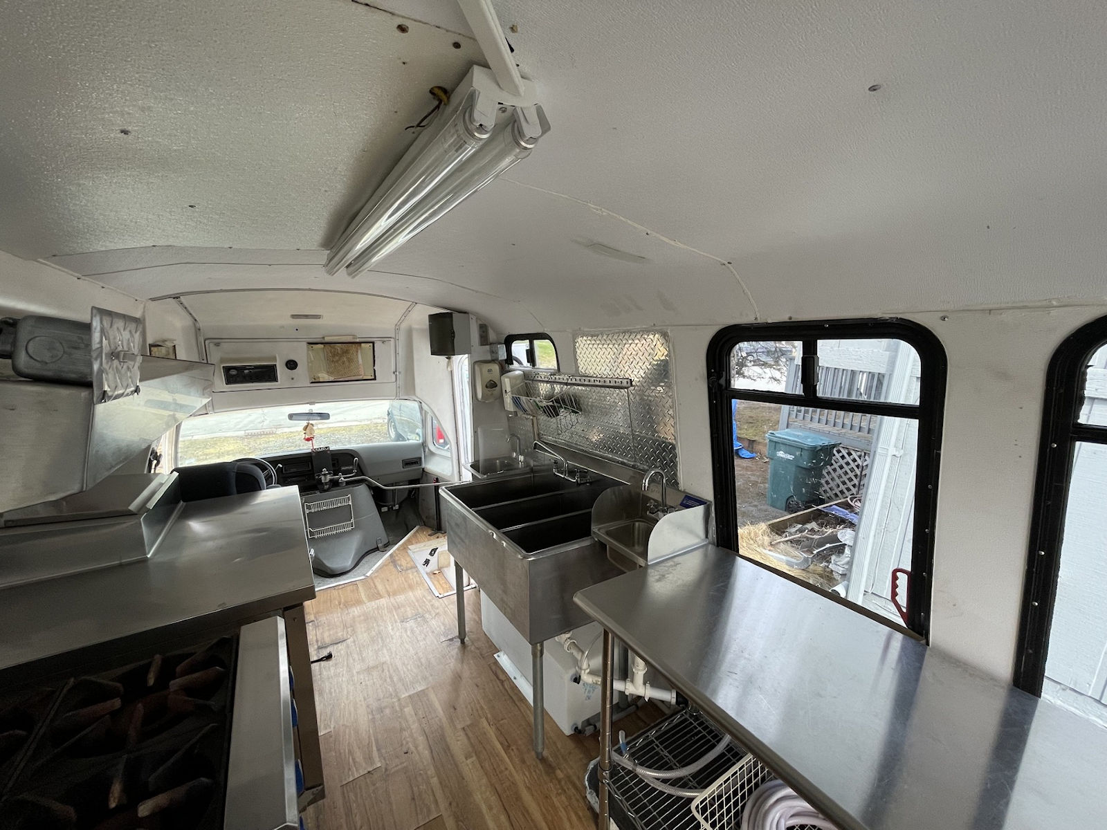 Commercial kitchen interior inside food truck - kitchen photo 18