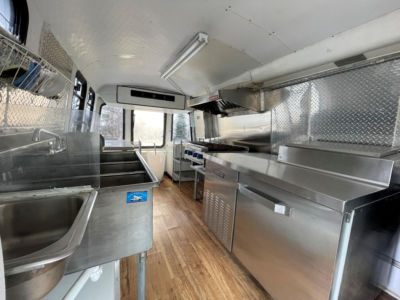 Commercial kitchen interior inside food truck - kitchen photo 2