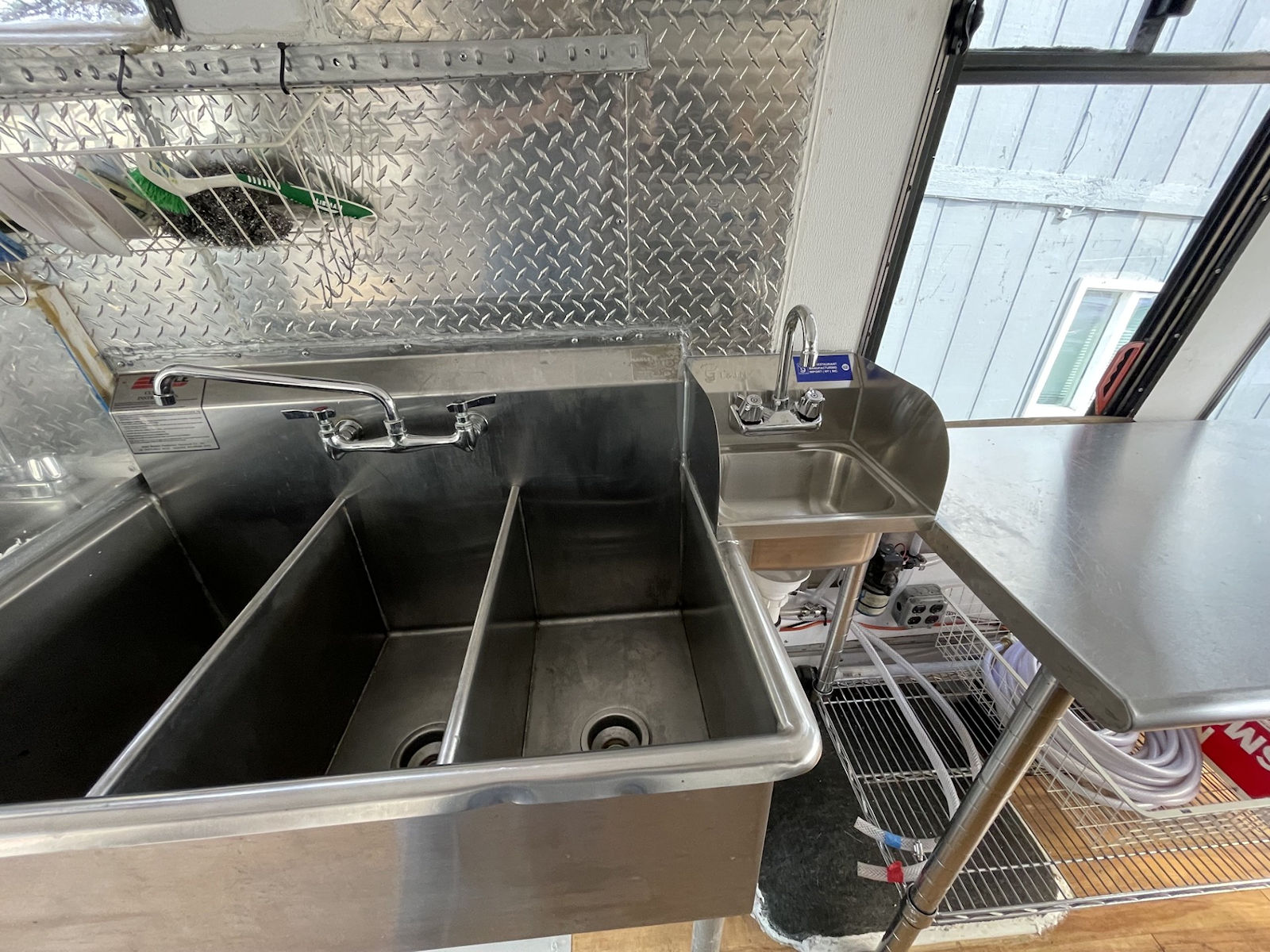 Commercial kitchen interior inside food truck - kitchen photo 6