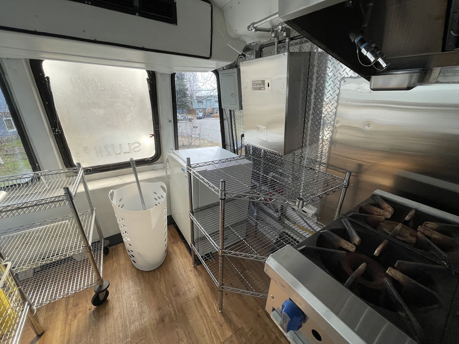 Commercial kitchen interior inside food truck - kitchen photo 8