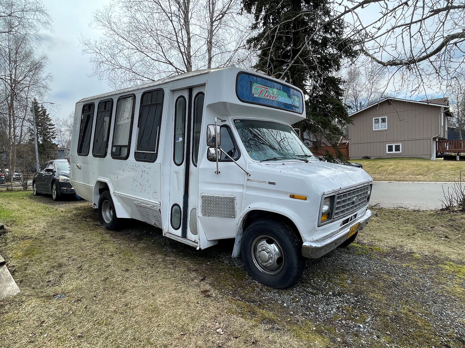 Passenger side front view of food truck for sale